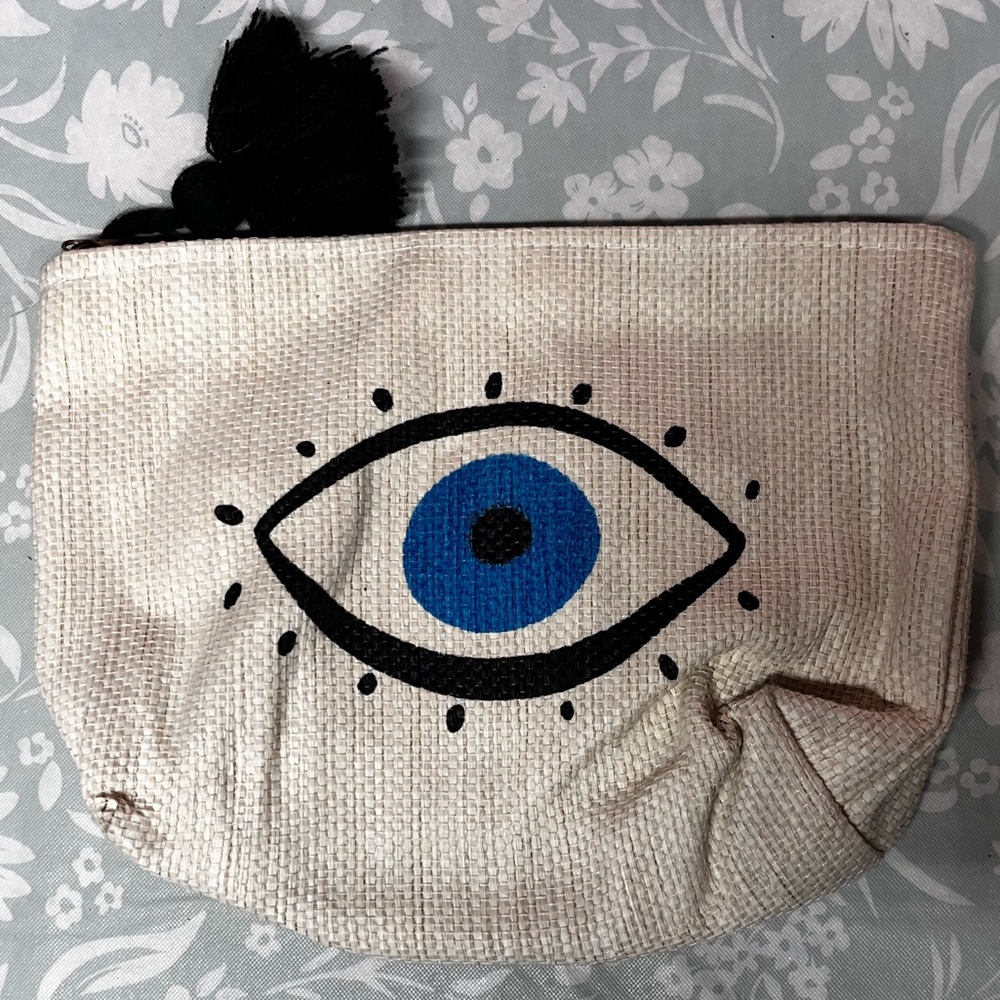 Beige Pouch with Blue Eye Design